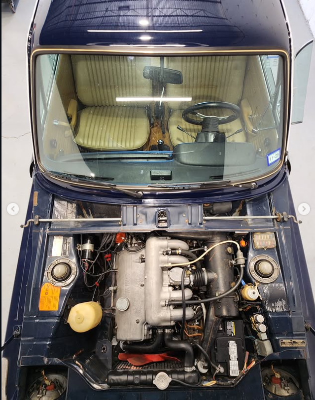 Same 2002tii engine bay after dry ice cleaning, noticeably cleaner with fresh detail throughout
